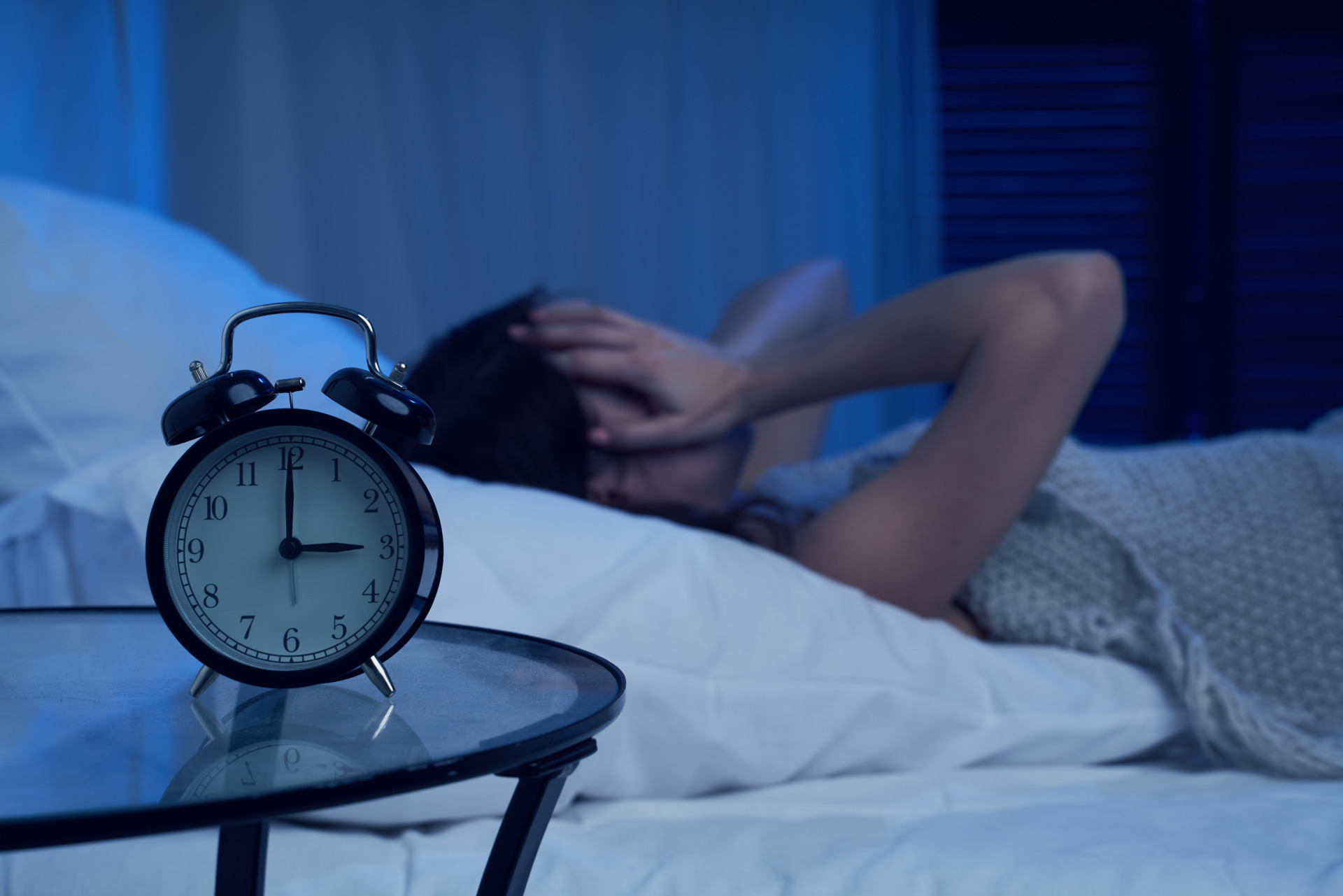 Person awake in the night, to illustrate cannabis for middle-of-the-night wakefulness