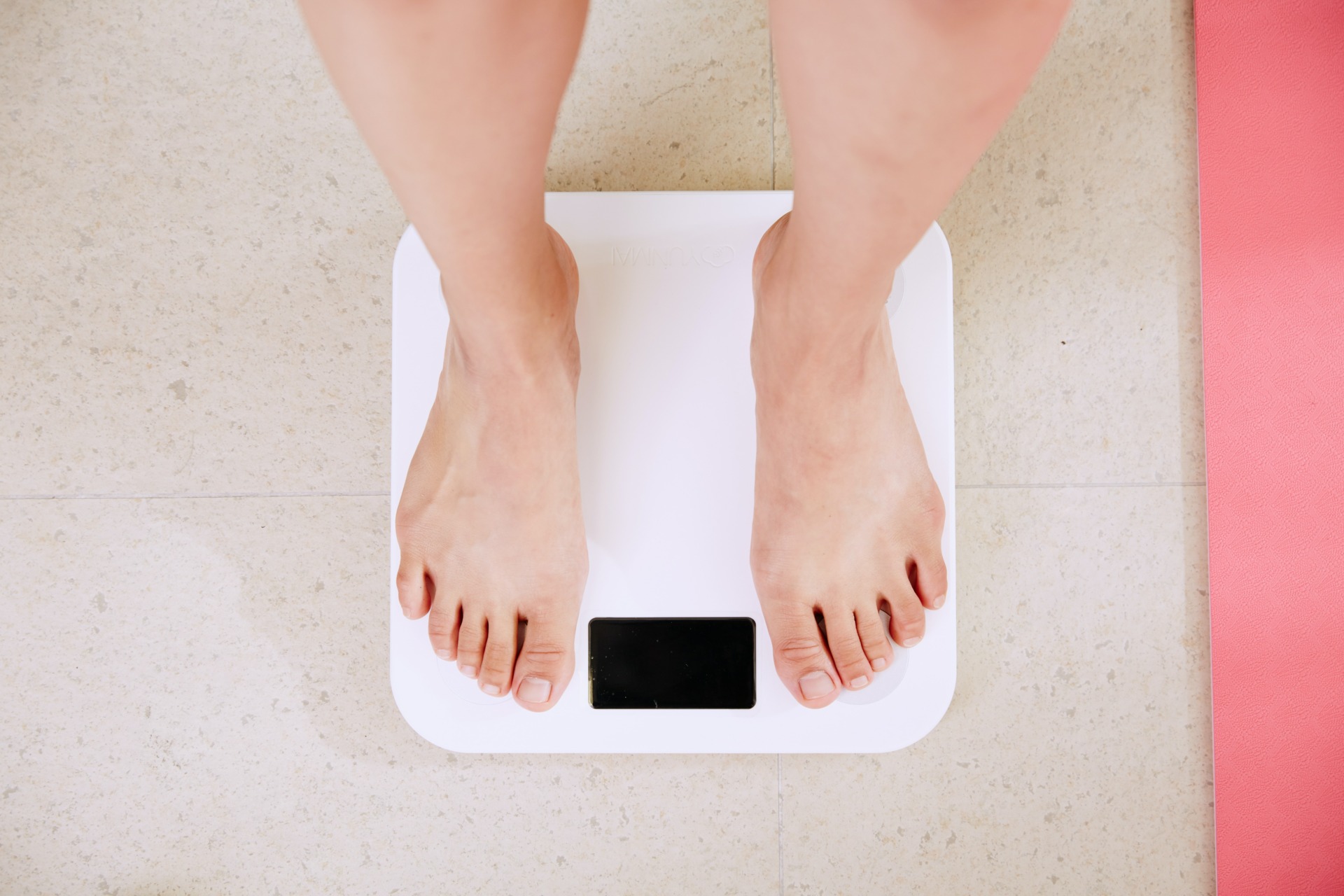Feet on scale, in relation to questions about cannabis and weight loss